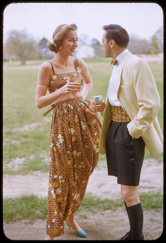 Two models wearing evening fashions in a 1956 Toni Frissell photograph made for Sports Illustrated.